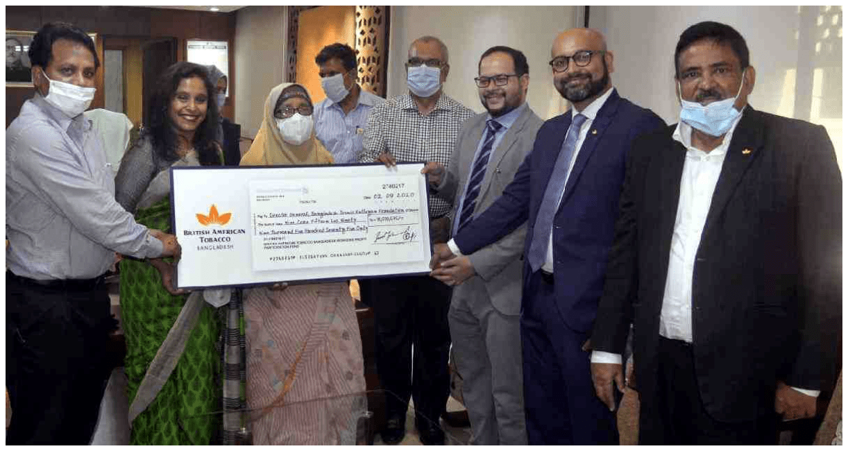 Photo of group of people holding a large cheque with the BAT logo